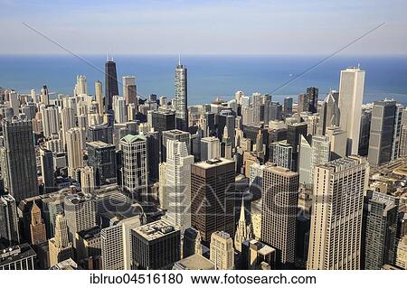 Stock Image - Skyline in front of Lake Michigan, view from John Hancock Center, Chicago, Illinois, USA, North America. Fotosearch
