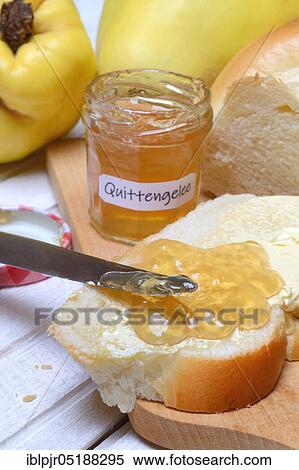 Slice of butter plait with quince jelly, quince jelly, Cydonia oblonga View Large Photo Image Stock Photography - Slice of butter plait with quince jelly, quince jelly, Cydonia oblonga. Fotosearch