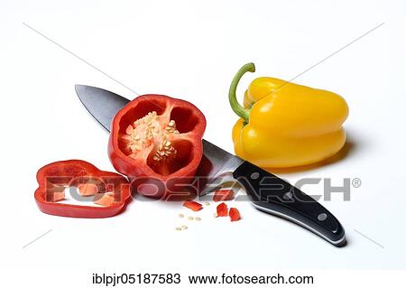 Stock Image - Sliced pepper with knife. Fotosearch