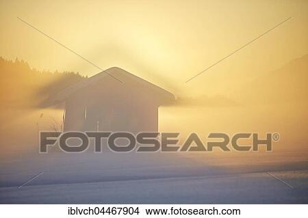 Small cabin, winter landscape, hay barn in fog at dusk, Kramsach, Tyrol, Austria, Europe View Large Photo Image Picture - Small cabin, winter landscape, hay barn in fog at dusk, Kramsach, Tyrol, Austria, Europe. Fotosearch