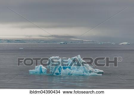 Small iceberg off the Austfonna glacier, Nordaustlandet, Svalbard, Spitsbergen, Norway, Europe View Large Photo Image Picture - Small iceberg off the Austfonna glacier, Nordaustlandet, Svalbard, Spitsbergen, Norway, Europe. Fotosearch