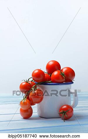 Stock Image - Small tomato. Fotosearch