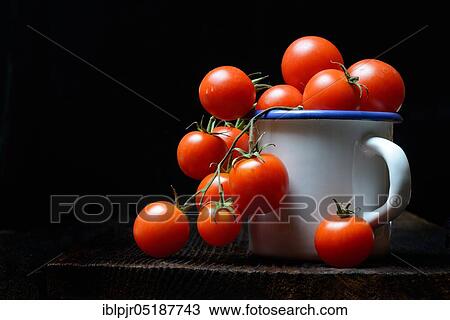 Stock Image - Small tomato. Fotosearch