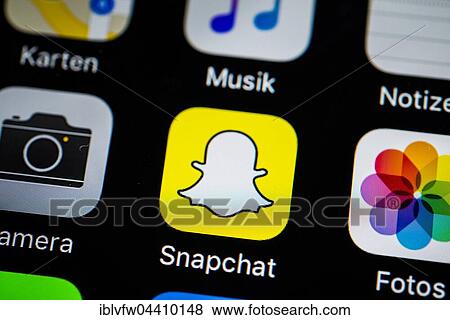Smartphone screen display with Photos and Snapchat app icons in detail View Large Photo Image Stock Photo - Smartphone screen display with Photos and Snapchat app icons in detail. Fotosearch