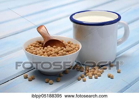 Stock Photography - Soy, soybeans in shell and soy milk in cup. Fotosearch