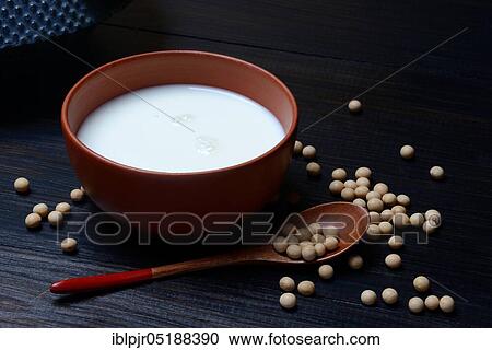 Stock Image - Soya, soya milk in shell and soya beans. Fotosearch