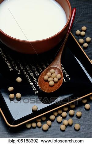 Stock Image - Soya, soya milk in shell and soya beans. Fotosearch