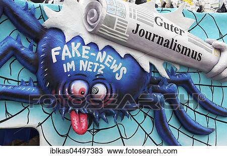 Spider in the web, good journalism beating Fake News, paper mache figure, political cartoon, motto Cart Carnival Monday procession 2017, Düsseldorf, Rhineland, North Rhine-Westphalia, Germany, Europe View Large Photo Image Stock Image - Spider in the web, good journalism beating Fake News, paper mache figure, political cartoon, motto Cart Carnival Monday procession 2017, Düsseldorf, Rhineland, North Rhine-Westphalia, Germany, Europe. Fotosearch