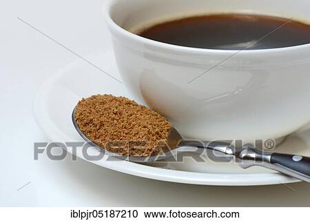 Spoon with coconut blossom sugar, coffee cup with coffee View Large Photo Image Stock Image - Spoon with coconut blossom sugar, coffee cup with coffee. Fotosearch