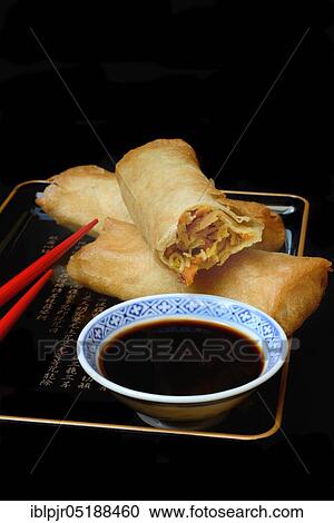 Spring rolls with soy sauce View Large Photo Image Stock Image - Spring rolls with soy sauce. Fotosearch