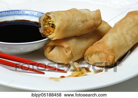 Spring rolls with soy sauce View Large Photo Image Stock Photo - Spring rolls with soy sauce. Fotosearch