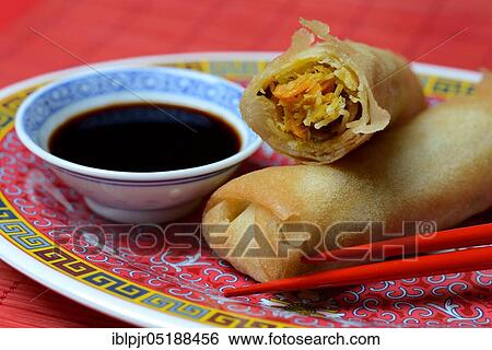 Spring rolls with soy sauce View Large Photo Image Stock Photograph - Spring rolls with soy sauce. Fotosearch