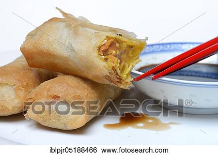 Spring rolls with soy sauce View Large Photo Image Stock Photograph - Spring rolls with soy sauce. Fotosearch