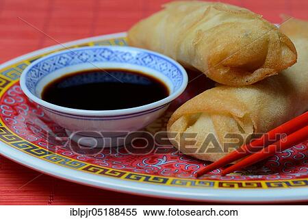 Stock Photography - Spring rolls with soy sauce. Fotosearch