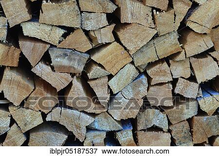 Stock Photo - Stacked firewood, logs, logs, storage. Fotosearch