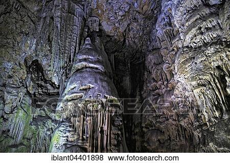 Stock Photo - stalactite cave St. Michael's Cave, limestone cave in the Upper Rock Nature Reserve, illuminated, Gibraltar, Europe. Fotosearch