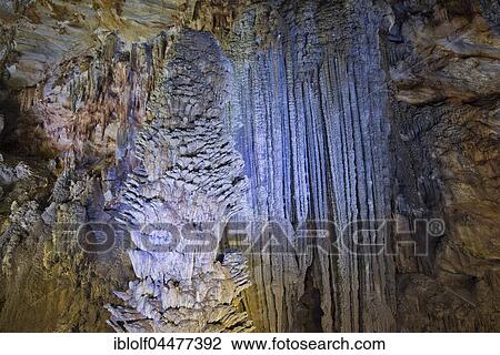 Stock Image - Stalactites and stalagmites, illuminated dripstone cave, Thiên Đường Cave, National Park Phong Nha-Ke Bang, Phong Nha, Quang Binh, Vietnam, Asia. Fotosearch