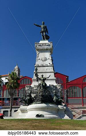 Stock Image - Statue of Henry the Navigator and former market hall, Mercado Ferreira Borges, Porto, Portugal, Europe. Fotosearch