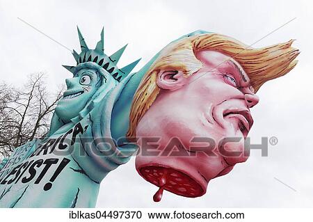 Statue of Liberty holding severed head of US President Donald Trump, paper mache figure, political caricature, motto cart Carnival Monday procession 2017, Düsseldorf, Rhineland, North Rhine-Westphalia, Germany, Europe View Large Photo Image Stock Image - Statue of Liberty holding severed head of US President Donald Trump, paper mache figure, political caricature, motto cart Carnival Monday procession 2017, Düsseldorf, Rhineland, North Rhine-Westphalia, Germany, Europe. Fotosearch