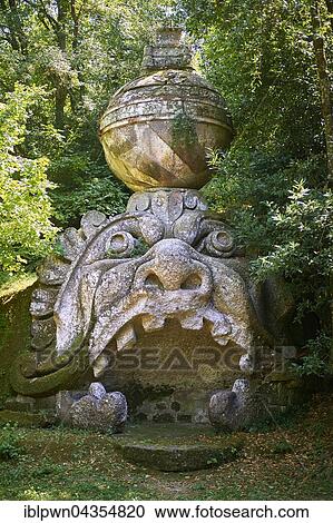 Statue of the head of Proteus, Park of Monsters or The Sacred Wood of Bamarzo, Bomarzo, Lazio, Italy, Europe View Large Photo Image Stock Image - Statue of the head of Proteus, Park of Monsters or The Sacred Wood of Bamarzo, Bomarzo, Lazio, Italy, Europe. Fotosearch