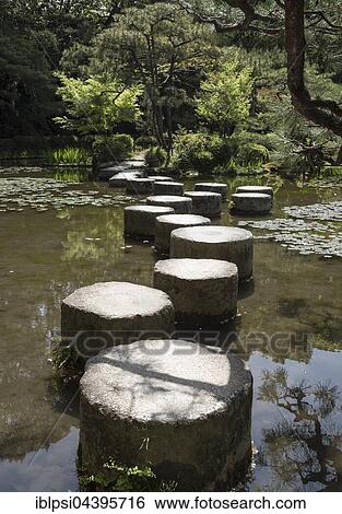 Stepping stones in pond at Heian Jingu gardens, Kyoto, Japan, Asia View Large Photo Image Stock Photograph - Stepping stones in pond at Heian Jingu gardens, Kyoto, Japan, Asia. Fotosearch