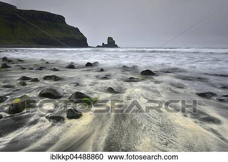 Stones in the sand on the beach of Talisker Bay, cliffs and rocks, Isle of Skye, Scotland, United Kingdom, Europe View Large Photo Image Stock Image - Stones in the sand on the beach of Talisker Bay, cliffs and rocks, Isle of Skye, Scotland, United Kingdom, Europe. Fotosearch