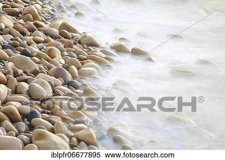 Stones on the beach, England, Great Britain View Large Photo Image Stock Photography - Stones on the beach, England, Great Britain. Fotosearch