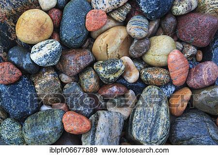 Stock Photo - Stones on the beach, Scotland, UK. Fotosearch