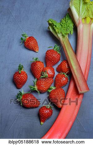 Strawberries and rhubarb, rhubarb stalks, rheum rhabarbarum, rhubarb stalks View Large Photo Image Stock Photo - Strawberries and rhubarb, rhubarb stalks, rheum rhabarbarum, rhubarb stalks. Fotosearch