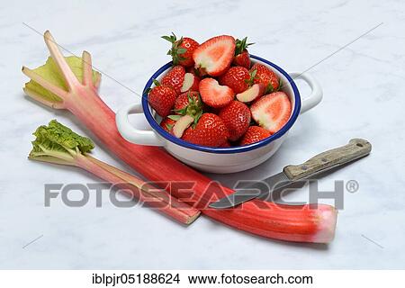 Strawberries in skin and rhubarb, rhubarb stalks, rheum rhabarbarum, rhubarb stalks View Large Photo Image Picture - Strawberries in skin and rhubarb, rhubarb stalks, rheum rhabarbarum, rhubarb stalks. Fotosearch
