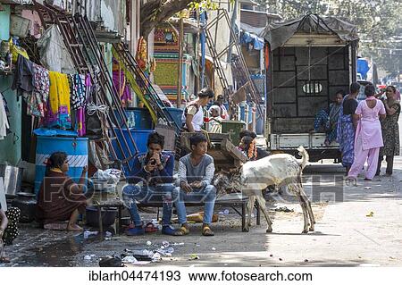 Stock Image - Street scene, slum, Mandvi district, Mumbai, Maharashtra, India, Asia. Fotosearch