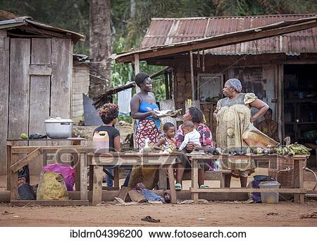 Street scene, woman at a food stall, village near the town of Campo, Southern Region, Cameroon, Africa View Large Photo Image Stock Image - Street scene, woman at a food stall, village near the town of Campo, Southern Region, Cameroon, Africa. Fotosearch