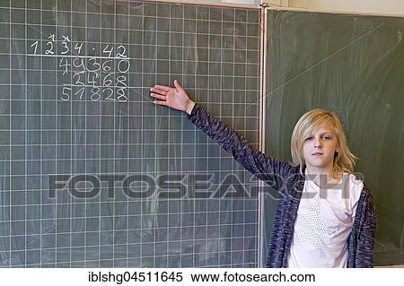 Student calculating on the blackboard, mathematics lessons, primary school, Lower Saxony, Germany, Europe View Large Photo Image Stock Photography - Student calculating on the blackboard, mathematics lessons, primary school, Lower Saxony, Germany, Europe. Fotosearch