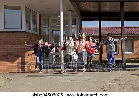Students after school, start of vacacions, running out of school, primary school, Lower Saxony, Germany, Europe View Large Photo Image Stock Photography - Students after school, start of vacacions, running out of school, primary school, Lower Saxony, Germany, Europe. Fotosearch