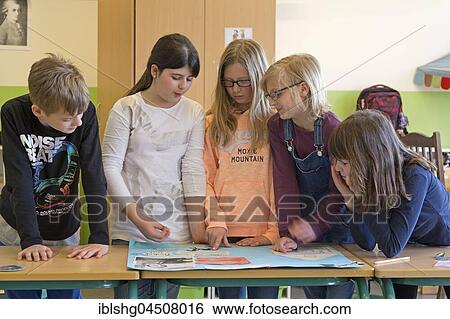 Students in group lessons, primary school, Lower Saxony, Germany, Europe View Large Photo Image Stock Photograph - Students in group lessons, primary school, Lower Saxony, Germany, Europe. Fotosearch