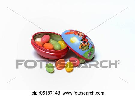 Sugar eggs in tin egg with rabbit figure View Large Photo Image Stock Photo - Sugar eggs in tin egg with rabbit figure. Fotosearch