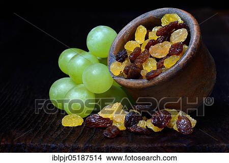 Picture - Sultana, raisins in shell and grapes. Fotosearch