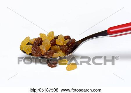 Stock Photo - Sultanas, raisins in spoon. Fotosearch