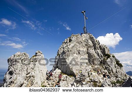 Stock Photo - Summit cross on the Kampenwand, Aschau, Bavaria, Germany, Europe. Fotosearch