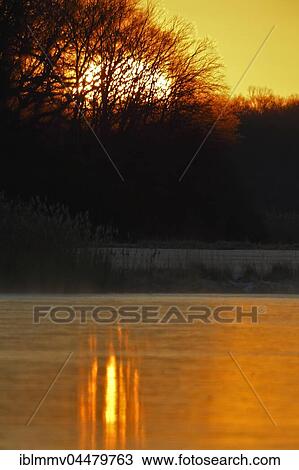 Sunrise over Leiner Lake in winter, Auwaldsee in winter at sunrise, Middle Elbe Biosphere Reserve, Saxony-Anhalt, Germany, Europe View Large Photo Image Stock Image - Sunrise over Leiner Lake in winter, Auwaldsee in winter at sunrise, Middle Elbe Biosphere Reserve, Saxony-Anhalt, Germany, Europe. Fotosearch
