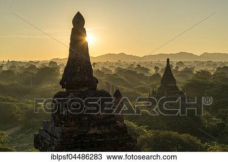 Sunrise over the temples and pagodas in the plain of Bagan, Myanmar, Asia View Large Photo Image Stock Image - Sunrise over the temples and pagodas in the plain of Bagan, Myanmar, Asia. Fotosearch