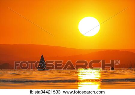 Sunset, sailboat on Gnadensee, Lake Constance, Hegne, Allensbach, Baden-Württemberg, Germany, Europe View Large Photo Image Stock Image - Sunset, sailboat on Gnadensee, Lake Constance, Hegne, Allensbach, Baden-Württemberg, Germany, Europe. Fotosearch