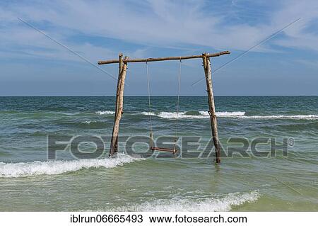 Swing in the ocean, Sao Beach, island of Phu Quoc, Vietnam, Asia View Large Photo Image Stock Image - Swing in the ocean, Sao Beach, island of Phu Quoc, Vietnam, Asia. Fotosearch