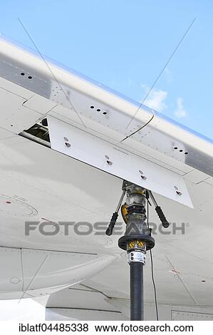 Tank nozzle on wing, refueling, Sun Express, Boeing B 737, Munich Airport, Upper Bavaria, Germany, Europe View Large Photo Image Stock Photo - Tank nozzle on wing, refueling, Sun Express, Boeing B 737, Munich Airport, Upper Bavaria, Germany, Europe. Fotosearch