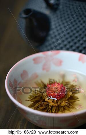 Tea flower in bowl, Tea bowl, White tea, Type Petite Princesse View Large Photo Image Stock Photo - Tea flower in bowl, Tea bowl, White tea, Type Petite Princesse. Fotosearch