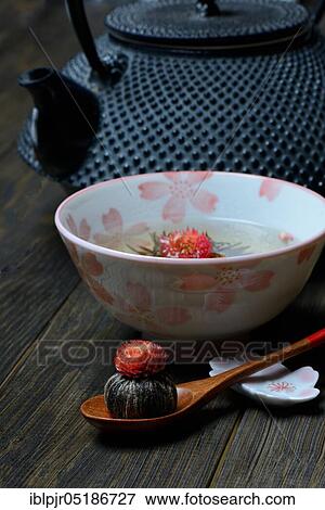 Tea flower in spoon and bowl, Tea bowl, White tea, variety Petite Princesse View Large Photo Image Stock Photo - Tea flower in spoon and bowl, Tea bowl, White tea, variety Petite Princesse. Fotosearch