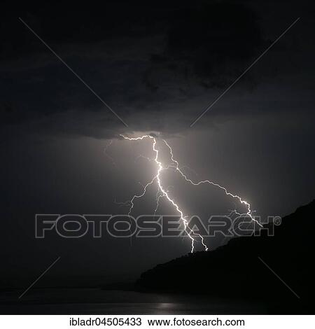Stock Image - Thunderstorm with lightning over the sea, East London, South Africa, Africa. Fotosearch