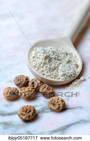 Tigernuts and tigernut flour in cooking spoon, Cyperus esculentus View Large Photo Image Stock Photo - Tigernuts and tigernut flour in cooking spoon, Cyperus esculentus. Fotosearch