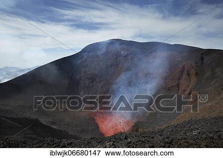Tolbachik volcano crater spews glowing lava and smoke, Kamchatka, Russia, Europe View Large Photo Image Stock Photo - Tolbachik volcano crater spews glowing lava and smoke, Kamchatka, Russia, Europe. Fotosearch