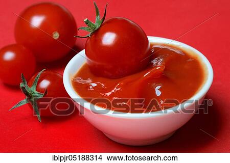 Tomato ketchup in shell and tomatoes View Large Photo Image Picture - Tomato ketchup in shell and tomatoes. Fotosearch